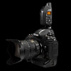 PocketWizard Plus III transceiver: on a Nikon camera, front angle view