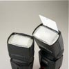 Canon Speedlite 430EX II vs. Canon Speedlite 580EX II: built-in white reflector card
