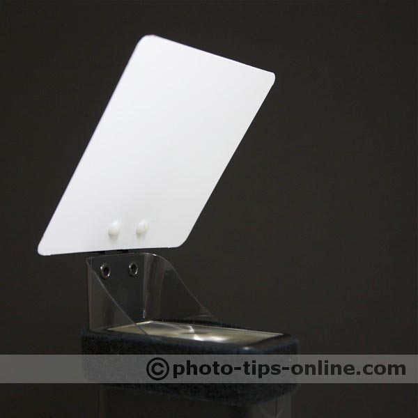 Demb Flip-it! flash reflector: mounted of a narrow flash head side, front