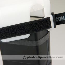 Gary Fong WhaleTail flash diffuser: rubber band and Velcro strap, attaching to a flash head
