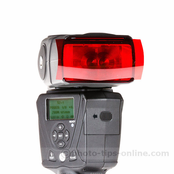 LumoPro LP180 flash: red gel installed, front view