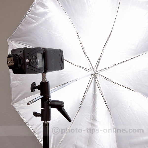 LumoPro LP180 flash: side mounted onto umbrella swivel adapter