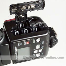 Nikon Speedlight SB-600 flash: polarity marks inside battery compartment