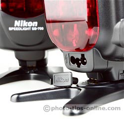 Nikon Speedlight SB-700 vs. Nikon Speedlight SB-900: external power pack connector of SB-900