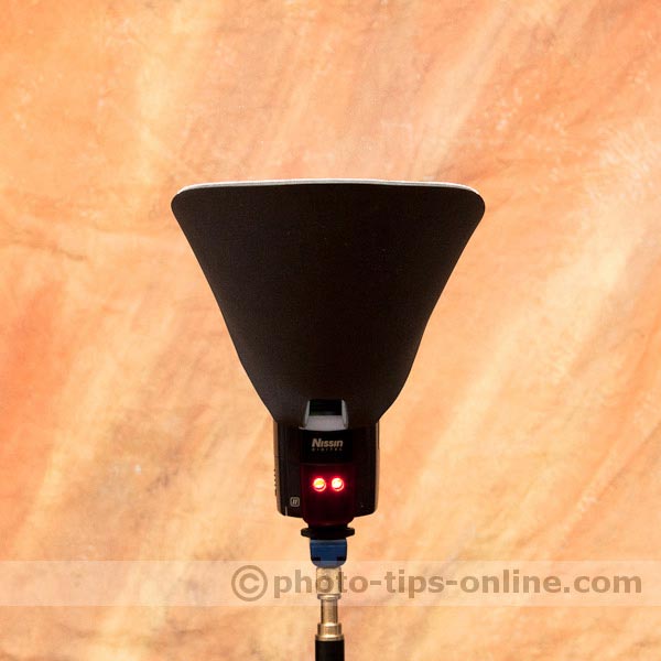 PRESSlite ECLIPSE Light Shield: front view, flash fired, stray light blocked
