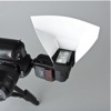 Promaster Universal Bounce Flash Reflector: portrait camera orientation, mounted on a narrow side of the flash