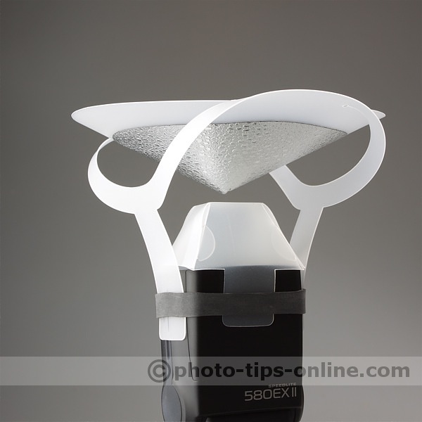 Speedlight Pro Kit Beauty Dish: small diffusion dome and inner silvered reflector attached to a flash head