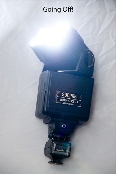 Off Camera Flash on a Budget: flash set off by camera's pop-up flash using optical slave adapter