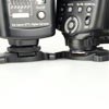Nissin Di622 II vs. Canon Speedlite 430EX II: hot-shoe attachment, screw-on vs. quick-release